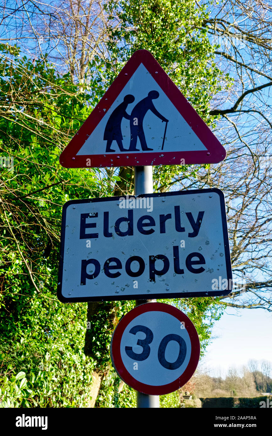 An Elderly People Crossing Road Sign to warn car drivers that they are approaching Henford House Care Home in Lower Marsh Road, Warminster, Wiltshire Stock Photo
