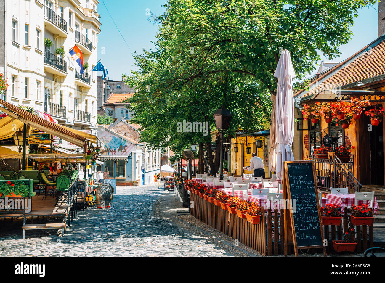 Belgrade, Serbia - July 16, 2019 : Skadarlija bohemian quarter, cafe and restaurant street at summer Stock Photo