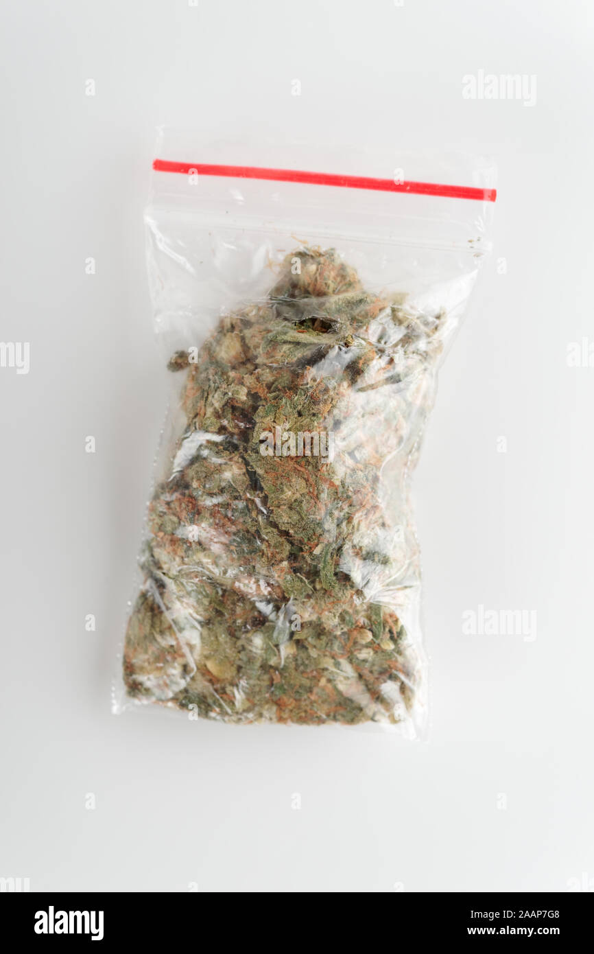 Plastic pack of marijuana — street drug package Stock Photo Alamy
