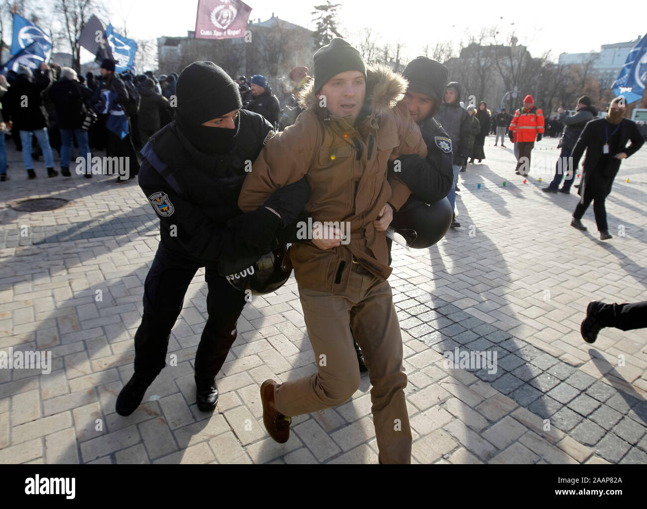 Policemen arrest a far-right activist during the march.Transgender rights activists in Ukraine’s capital Kyiv held a march to mark Transgender Day of Remembrance. In 2018, the police failed to protect those participating in a similar march from attacks by violent groups advocating hatred and discrimination. This year, there is a serious risk of new attacks and the police must ensure people can safely exercise their rights to freedom of peaceful assembly and expression without discrimination. Stock Photo