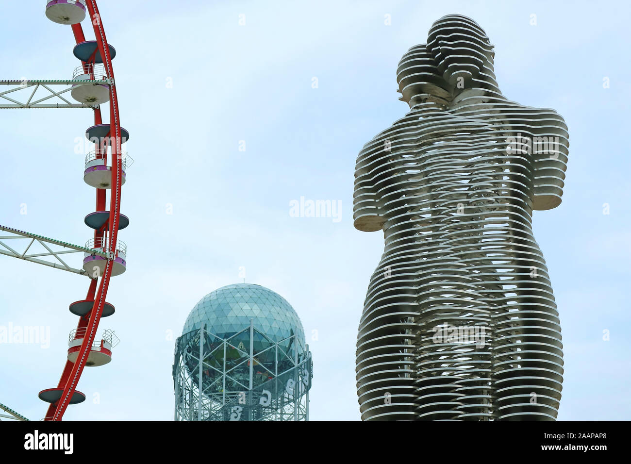 Moving and Passing Through Each Other Steel Statues of Lovers Ali and