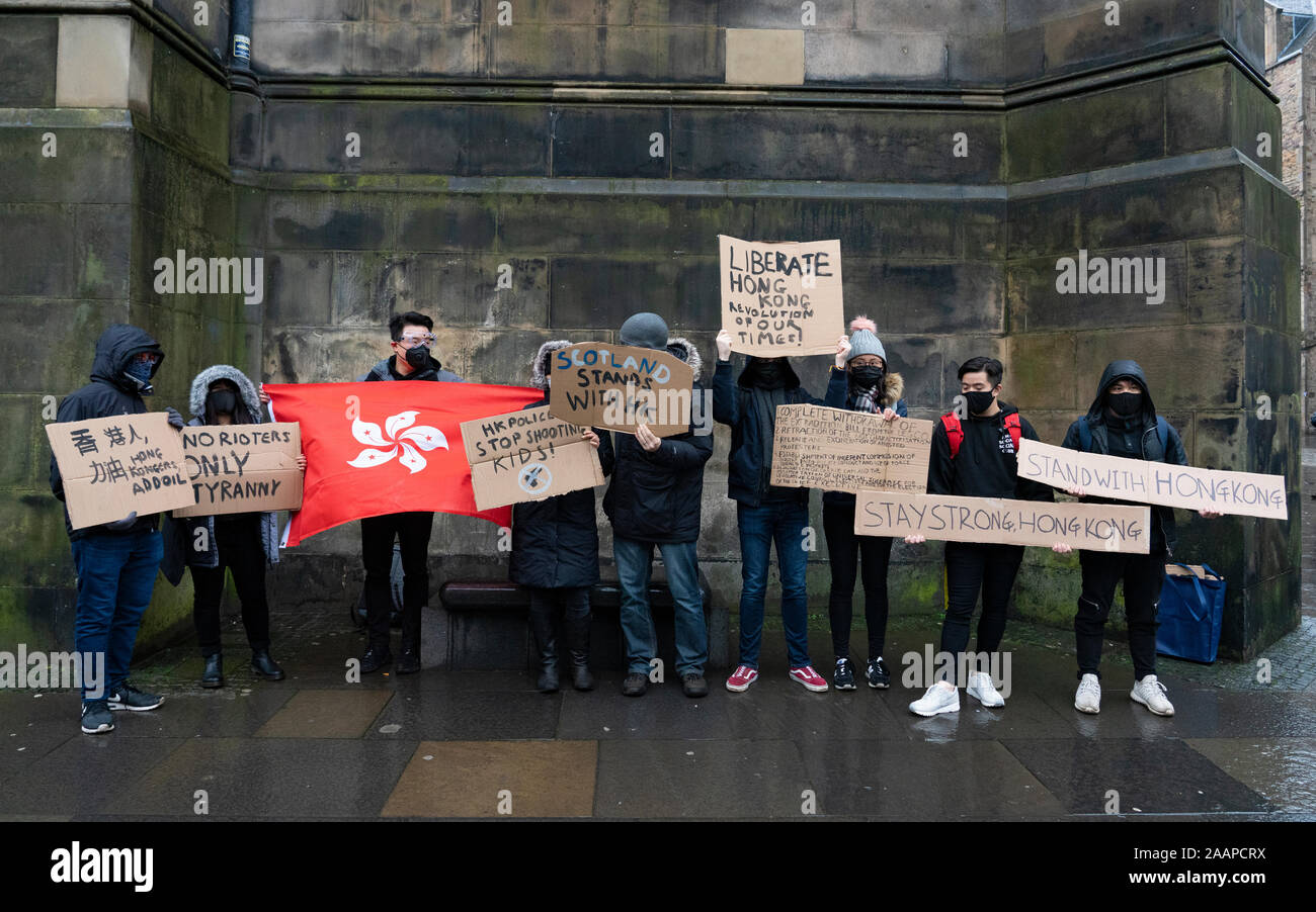 Edinburgh, Scotland, UK. 23rd November 2019.  Rally and march in support of Pro-Democracy movement in Hong Kong organised by the Democracy for Hong Kong in Scotland group started at St Giles Cathedral and proceeded along the Royal Mile to the Scottish Parliament. They attempted to hand over a letter asking for the Scottish Government to support the Pro-Democracy movement in Hong Kong but no MSP (Member of Scottish Parliament ) made themselves available to receive it. Iain Masterton/Alamy Live News. Stock Photo