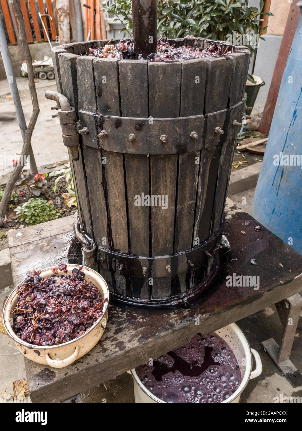 Making wine at home. Old wooden wine press Stock Photo