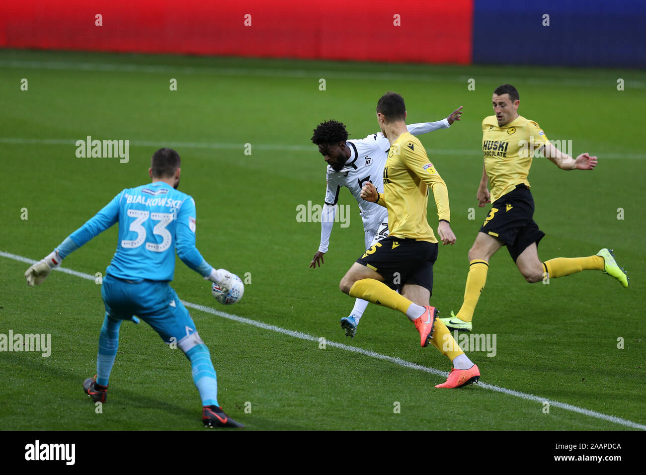 Liberty Stadium in Swansea, South Wales on Saturday 23rd November 2019. Nathan Dyer of Swansea city (centre) shoots wide of Millwall goalkeeper Bartosz Bialkowski in the 1st half. EFL Skybet championship match, Swansea city v Millwall at the  this image may only be used for Editorial purposes. Editorial use only, license required for commercial use. No use in betting, games or a single club/league/player publications. pic by Andrew Orchard/Andrew Orchard sports photography/Alamy Live news Credit: Andrew Orchard sports photo Credit: Andrew Orchard sports photography/Alamy Live News Stock Photo