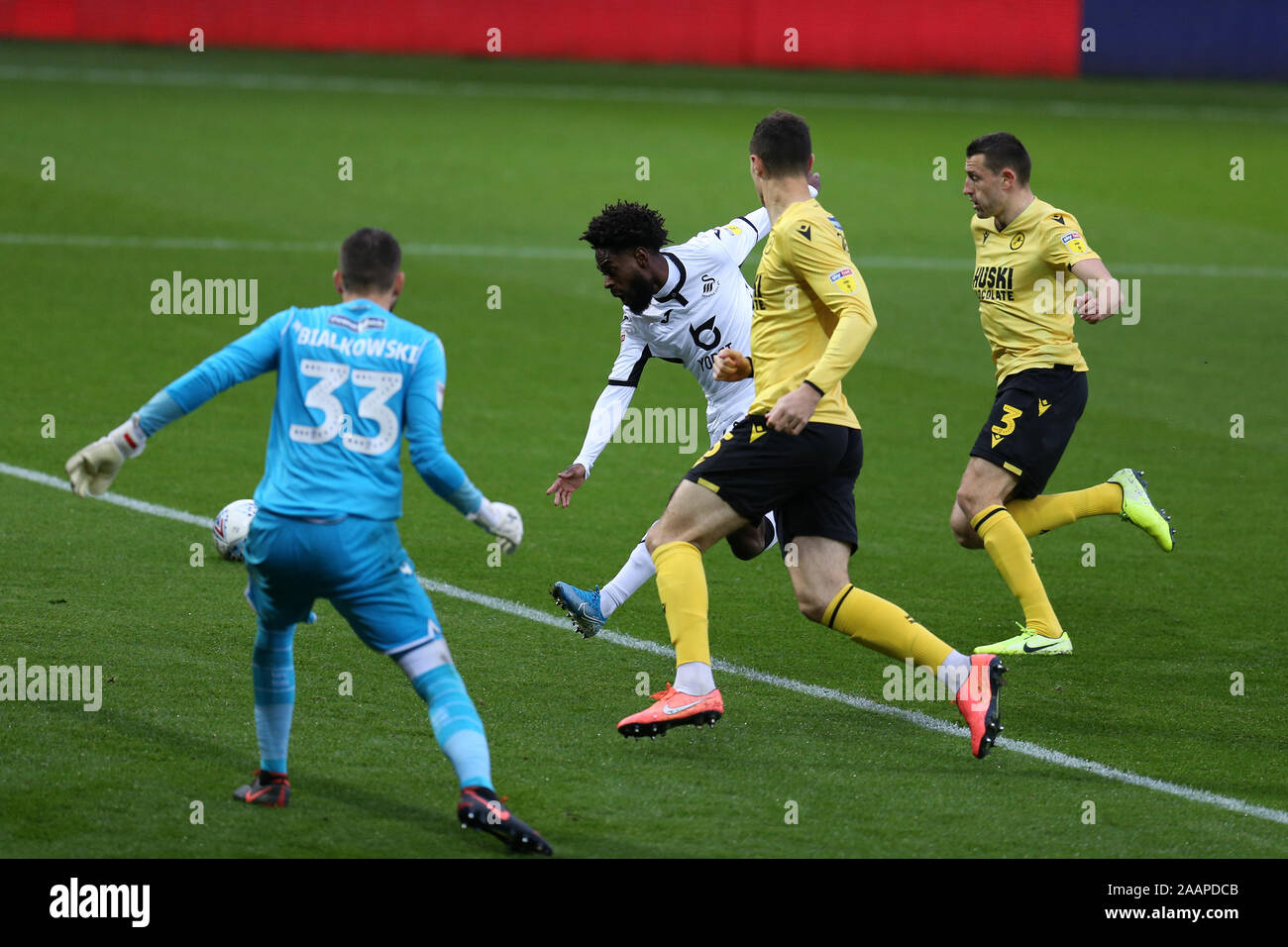 Liberty Stadium in Swansea, South Wales on Saturday 23rd November 2019. Nathan Dyer of Swansea city (centre) shoots wide of Millwall goalkeeper Bartosz Bialkowski in the 1st half. EFL Skybet championship match, Swansea city v Millwall at the  this image may only be used for Editorial purposes. Editorial use only, license required for commercial use. No use in betting, games or a single club/league/player publications. pic by Andrew Orchard/Andrew Orchard sports photography/Alamy Live news Credit: Andrew Orchard sports photo Credit: Andrew Orchard sports photography/Alamy Live News Stock Photo