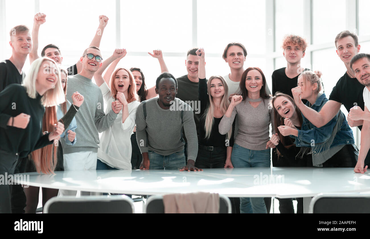 large group of happy young people standing together Stock Photo - Alamy