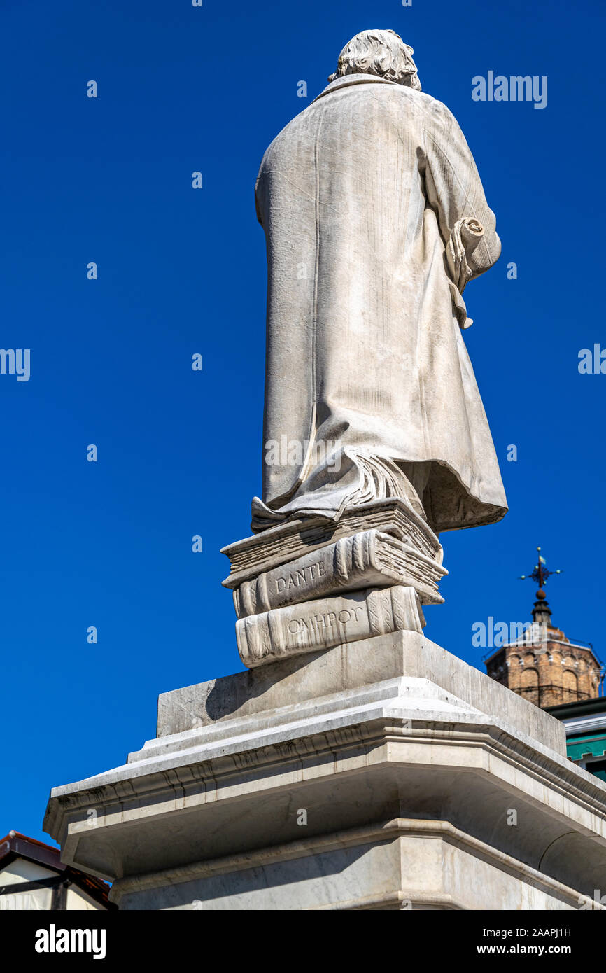 The rear of the statue of Niccolò Tommaseo in Campo Santo Stefano, Venice, Italy showing the titles of the books on which it stands Stock Photo