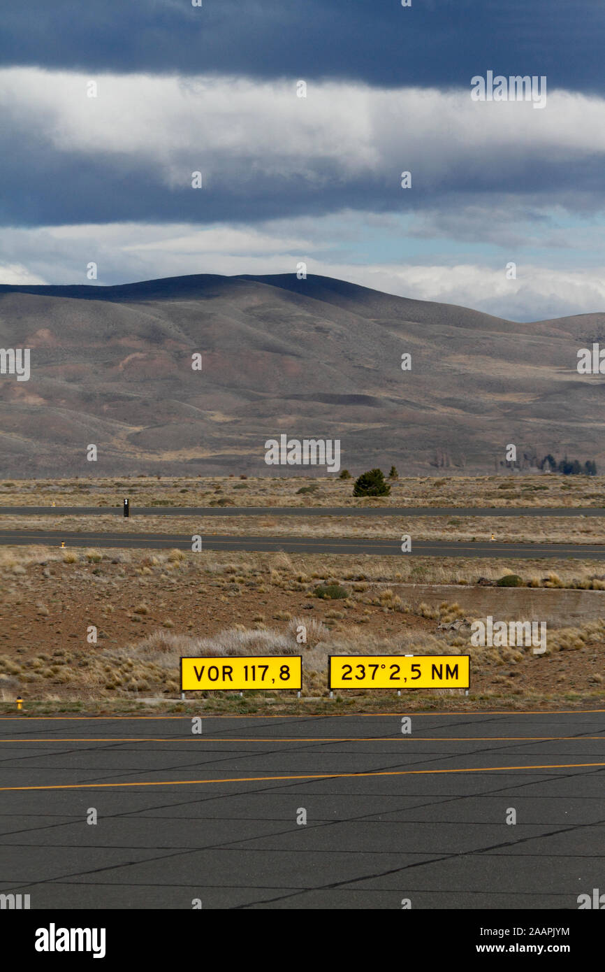 Esquel Airport, Aeropuerto de Esquel. Tarmac and runway. Empty. Mountains backdrop. Stock Photo