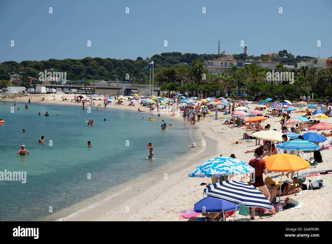 View of Antibes beach and shoreline on a sunny day with blue sky Stock Photo