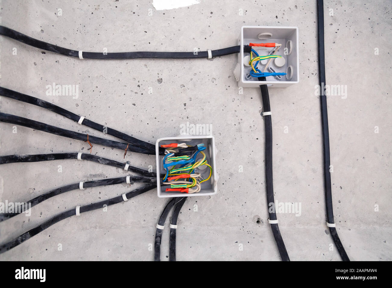 Cable laying ceiling. Electrical wires on wall. Wiring replacement