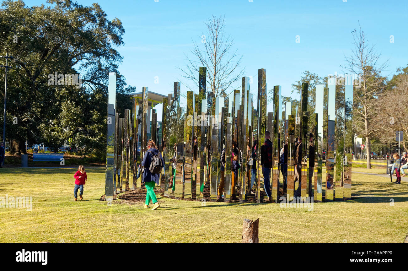 Mirror Labyrinth sculpture; 2017; Jeppe Hein; steel and mirrors; people walking among panels; children playing; art; grass, Besthoff Sclupture Gardens Stock Photo