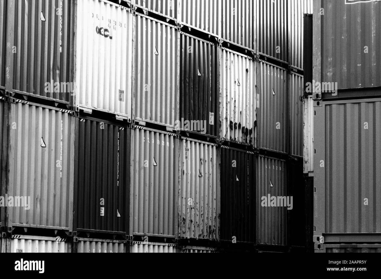Loading of shipping containers Black and White Stock Photos & Images ...