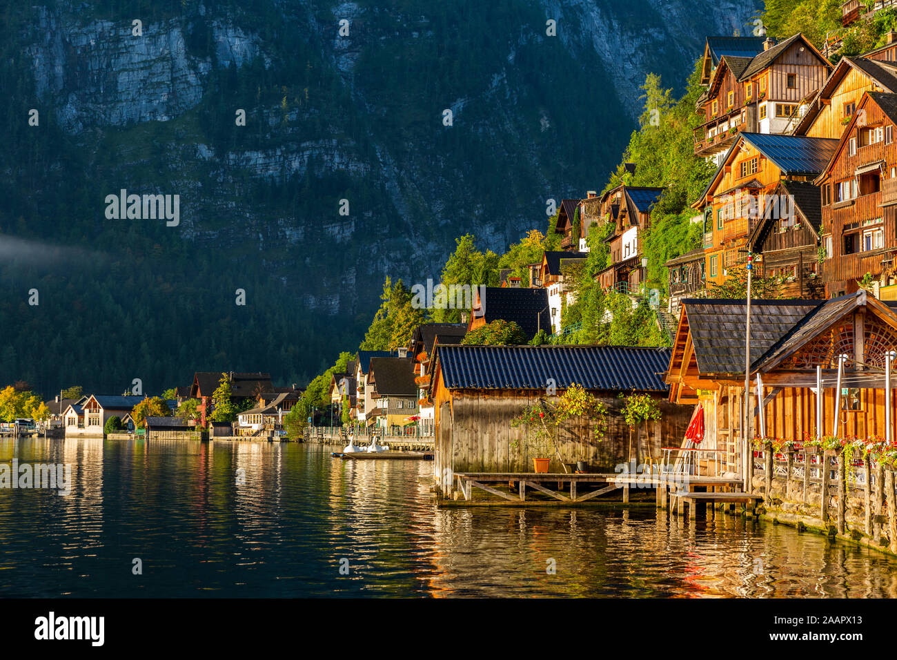 Wooden houses of the Hallstatt village in the sunrise light Stock Photo