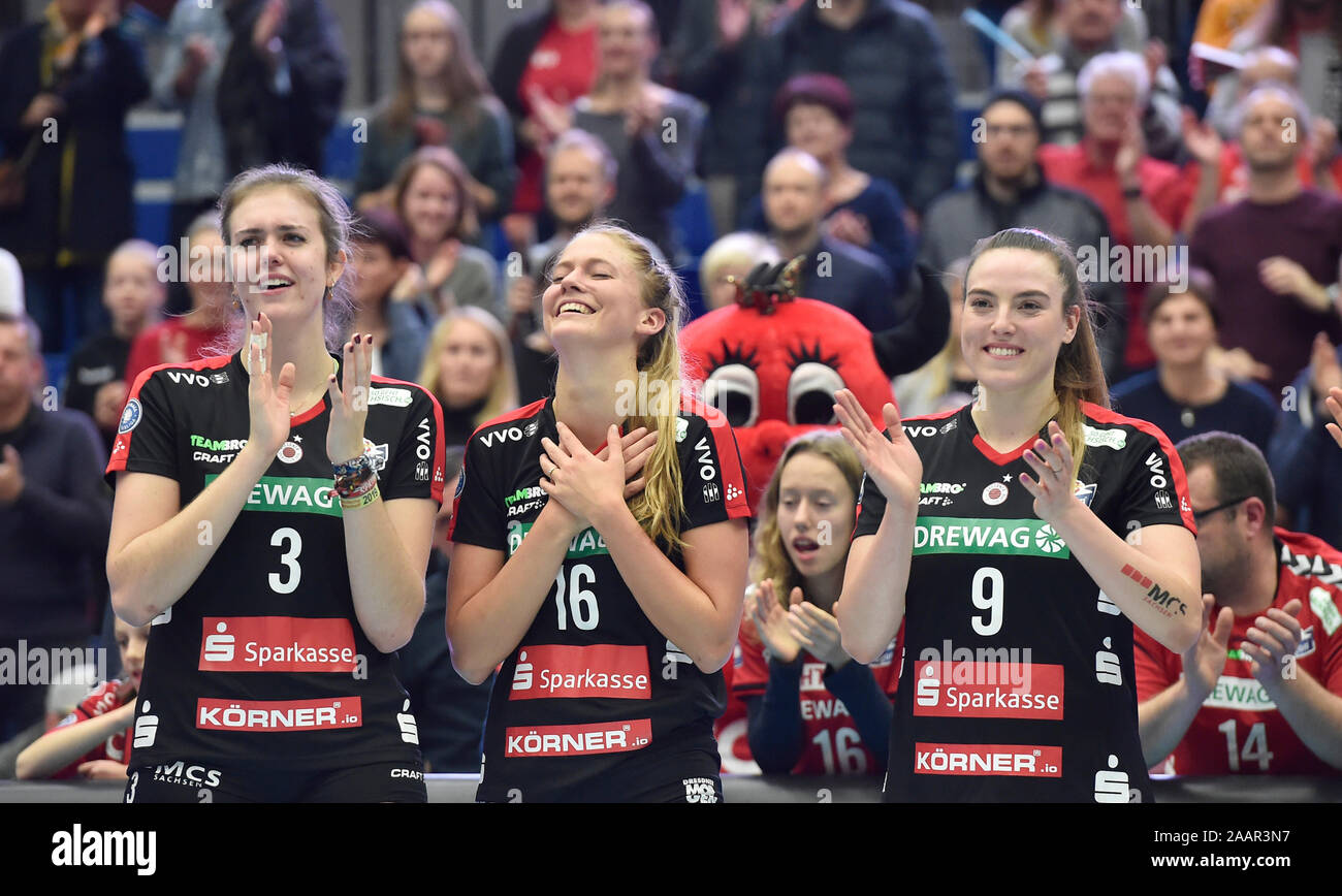 Dresden, Germany. 23rd Nov, 2019. Volleyball, women: DVV Cup, Dresdner SC -  Ladies in Black Aachen. Dresden's Emma Cyrus (l-r), Brie King and Lucija  Mlinar are happy about their game victory. Credit: