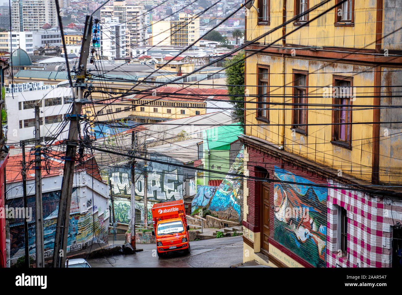 Colorful graffiti street art adorns the walls and buildings of