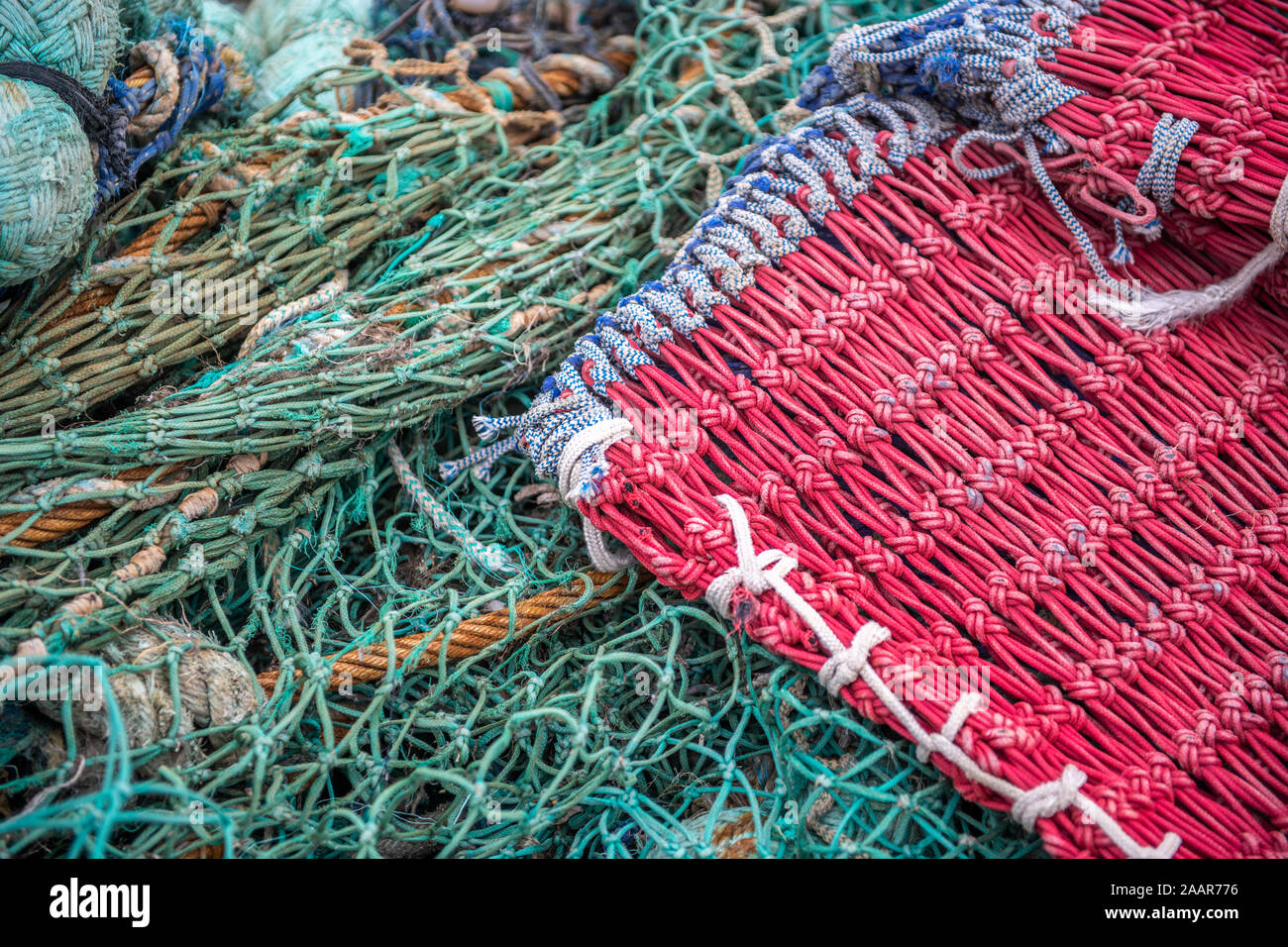 Fishing nets and crabbing crates sit on the docks of Whitby, United