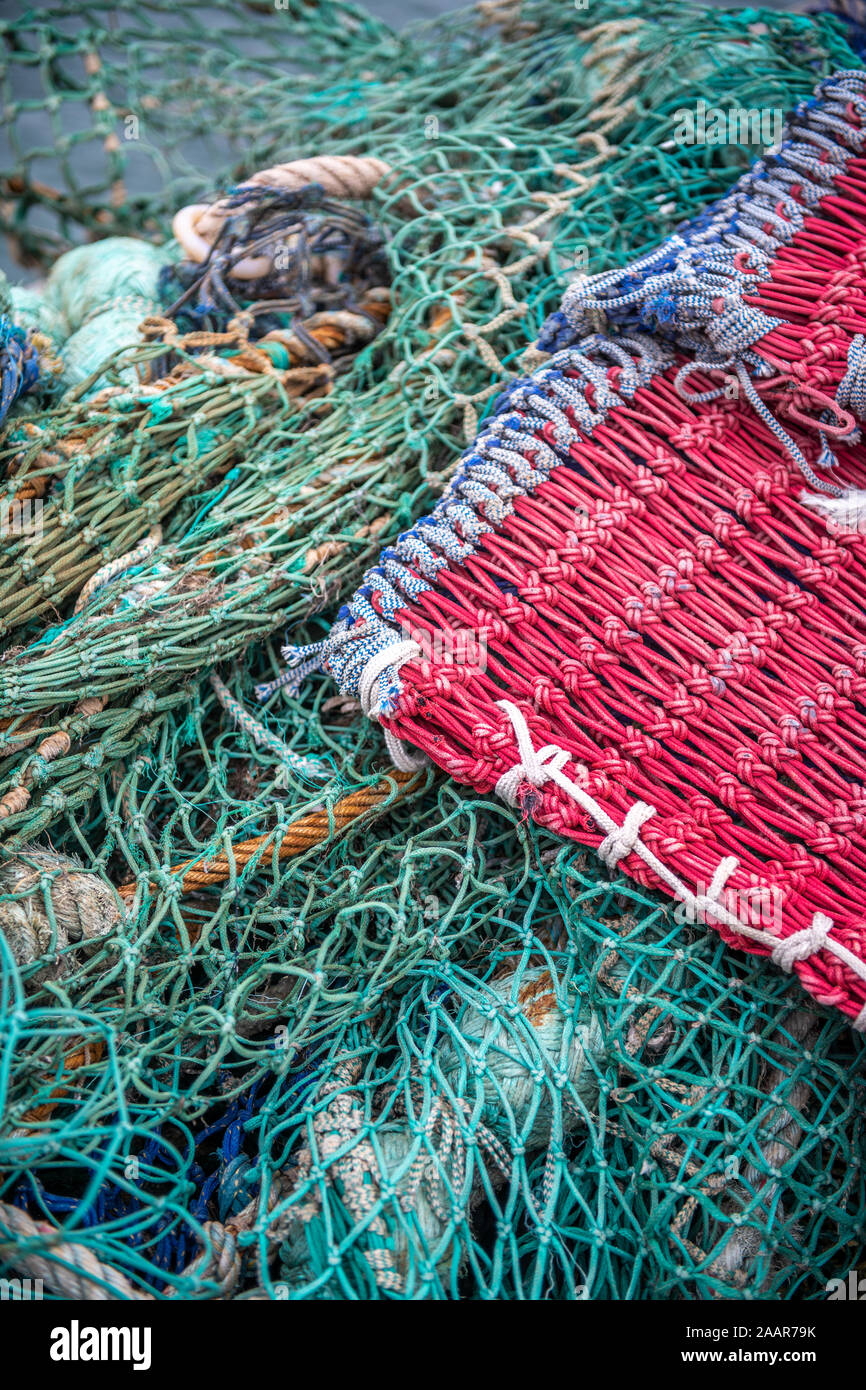 Fishing nets and crabbing crates sit on the docks of Whitby, United