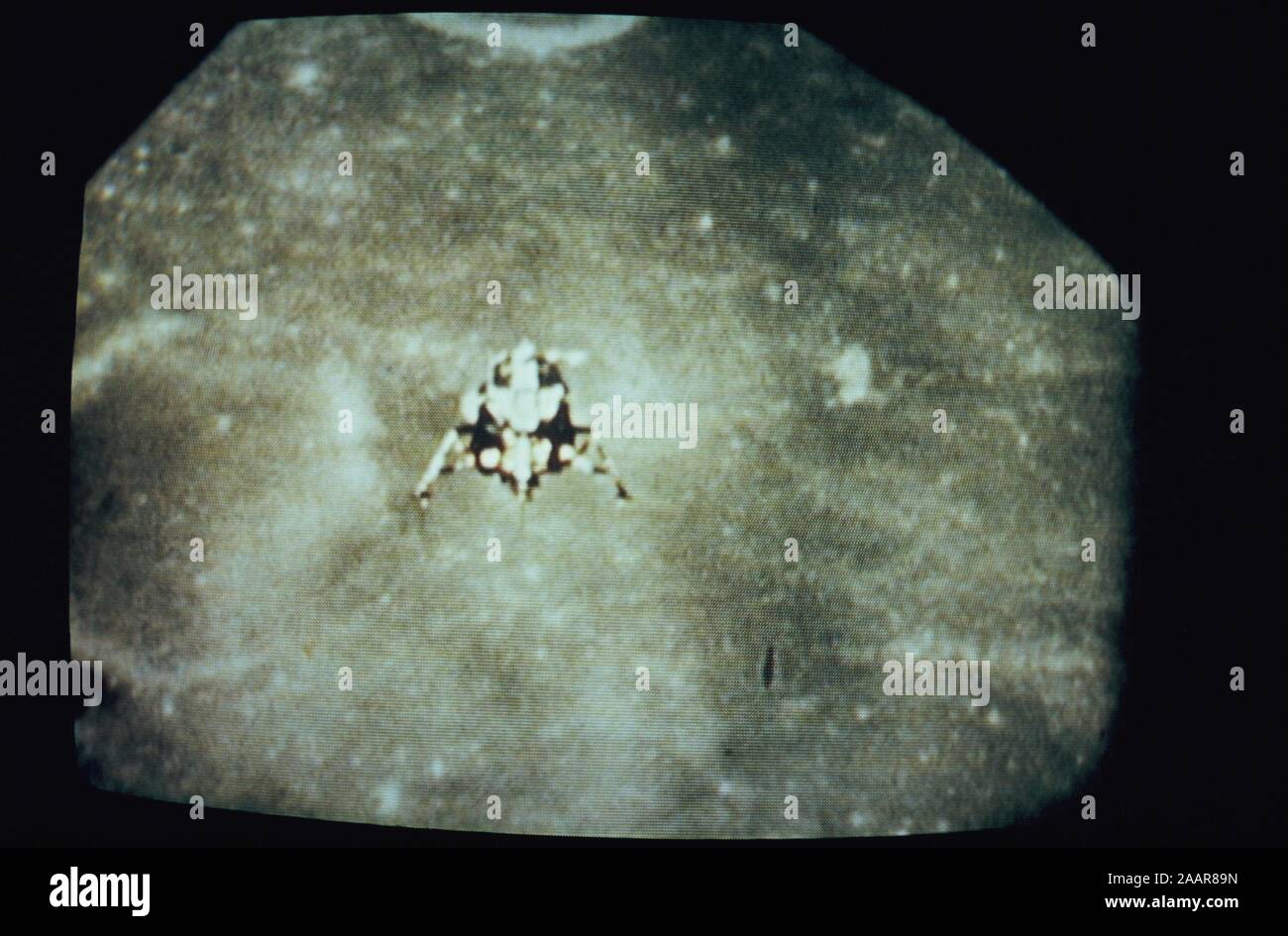 Teleclip - Apollo 11 Lunar Module Descent to Moon surface photo taken directly from TV screen circa 1969-1972, UK. Stock Photo