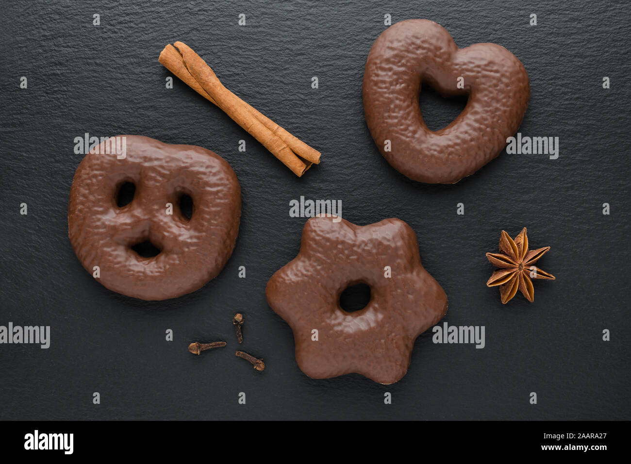 traditional german christmas chocolate gingerbread lebkuchen with cinnamon sticks, anise and clove Stock Photo