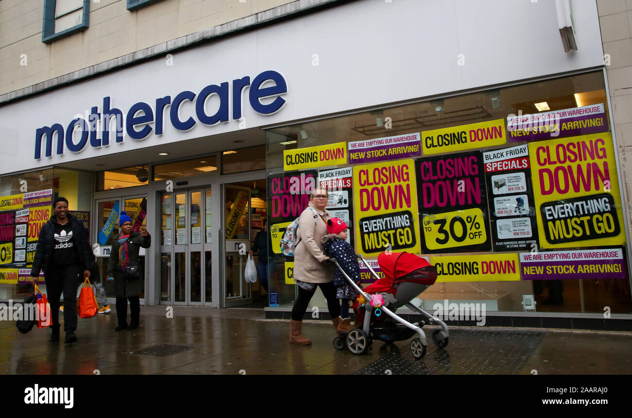 Wood Green, London, UK. 23 Nov 2019. Closing down and sale signs on display  in the widow of Mothercare store in Wood Green, North London. Mothercare is  to close all of its