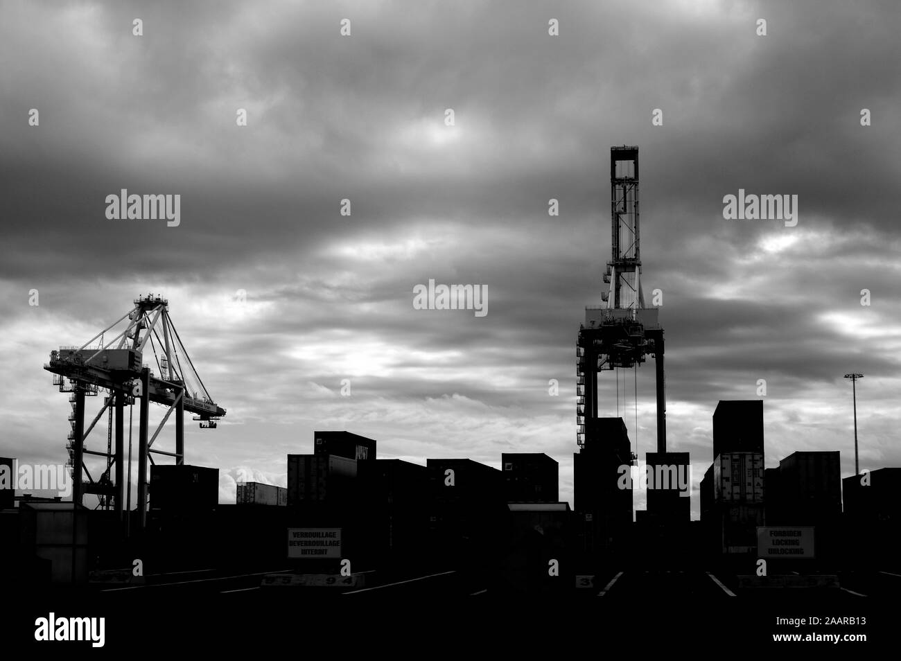 Cargo container lift cranes Black and White Stock Photos & Images - Alamy