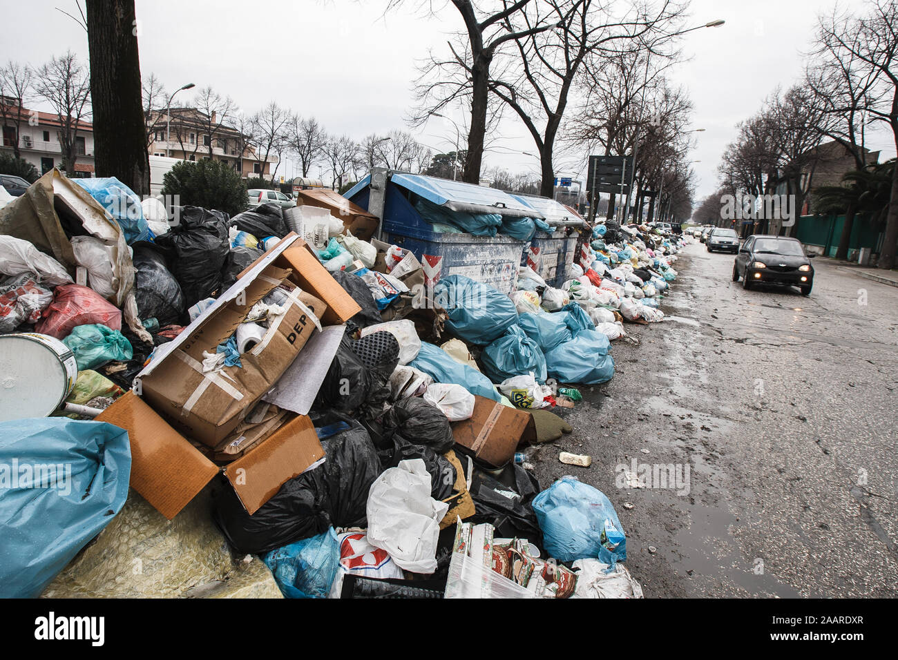 Caserta, Italy, February 21, 2008: Waste accumulates on a street in Caserta, Italy, north of Naples during the Naples waste management crisis in 2008. Stock Photo