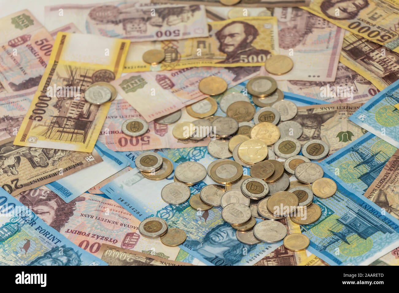 A composition of Hungarian forint. HUF banknotes and coins providing great options to be used for illustrating subjects as business, banking, media, p Stock Photo