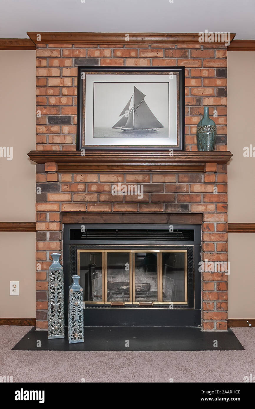 Typical fireplace inside a private residence in the USA. Stock Photo