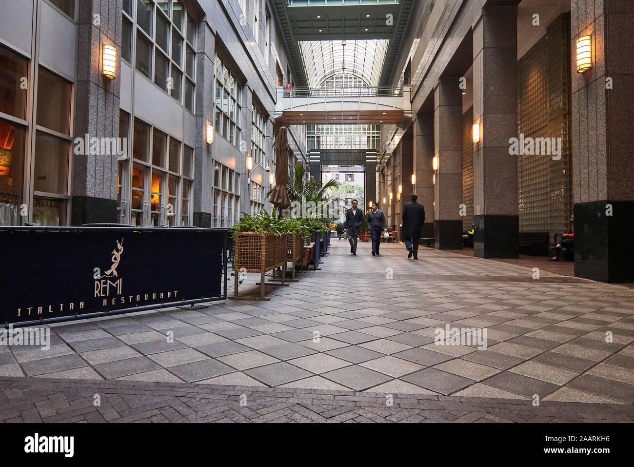 view of the massive midtown buildings in Manhattan from street level
