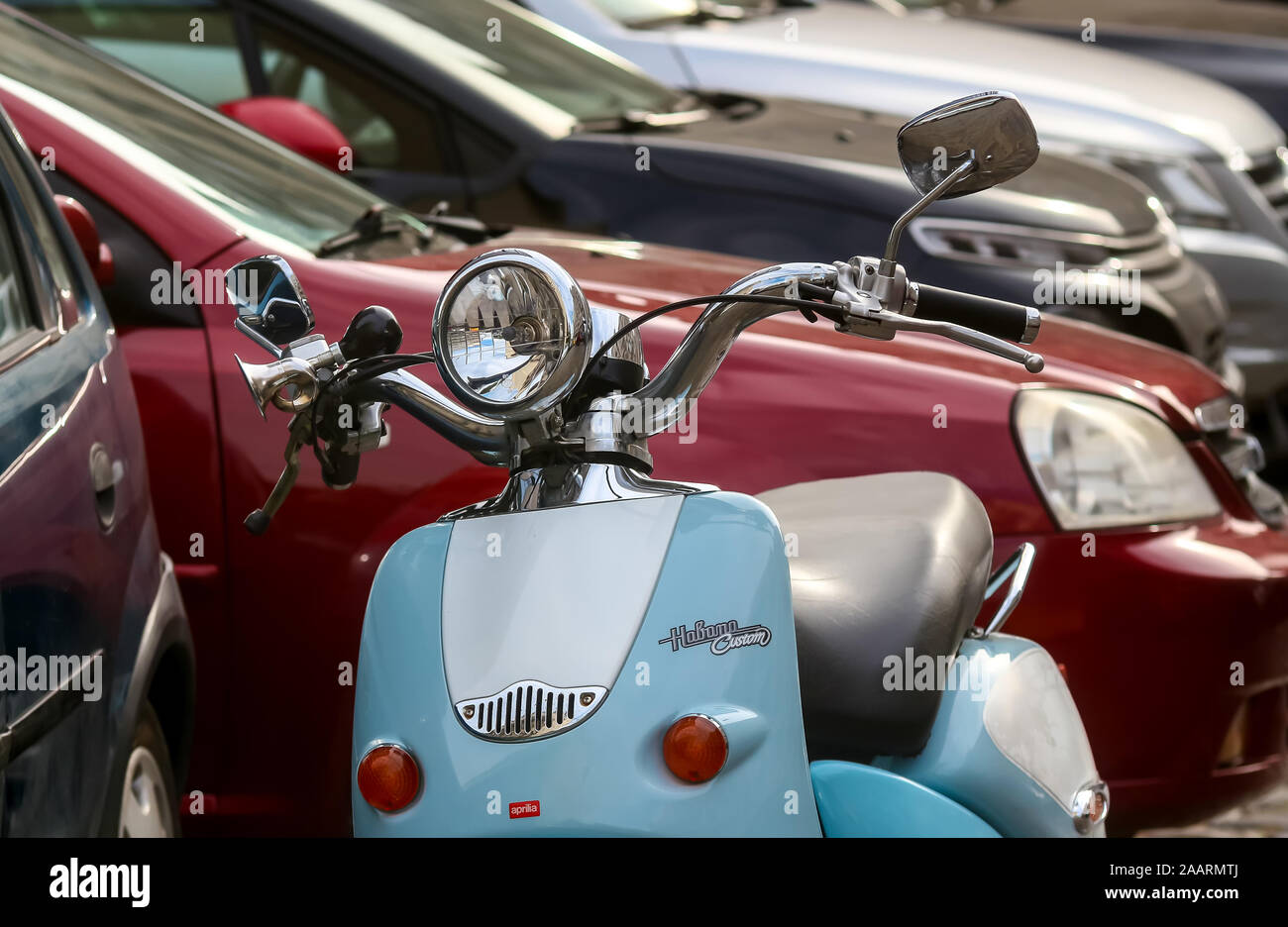 Bucharest, Romania - November 07, 2019: An Aprilia Habana Custom scooter is seen in front of several cars parked on a street in Bucharest. Stock Photo