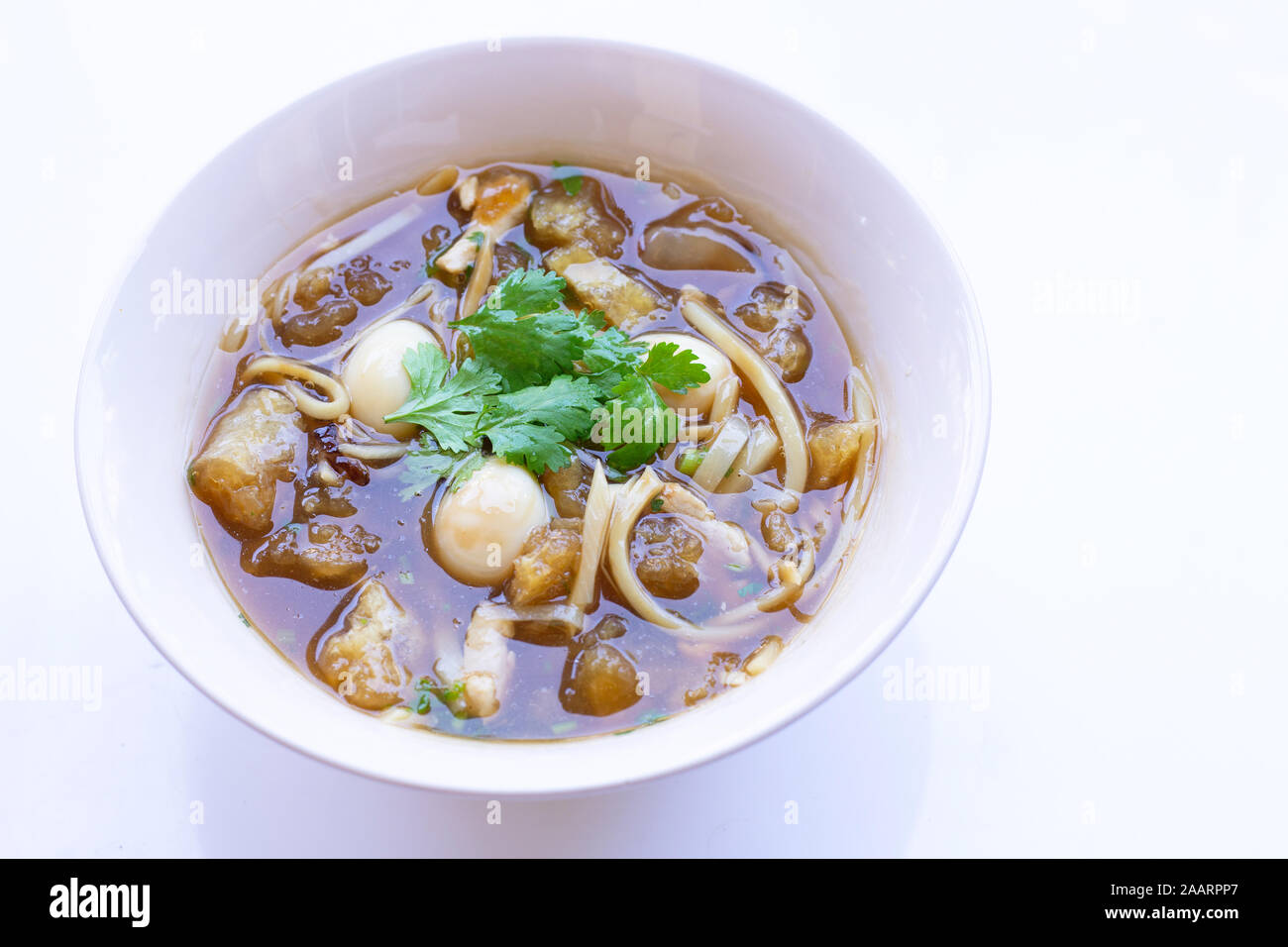 Braised fish maw in red gravy in bowl on white background Stock Photo Alamy