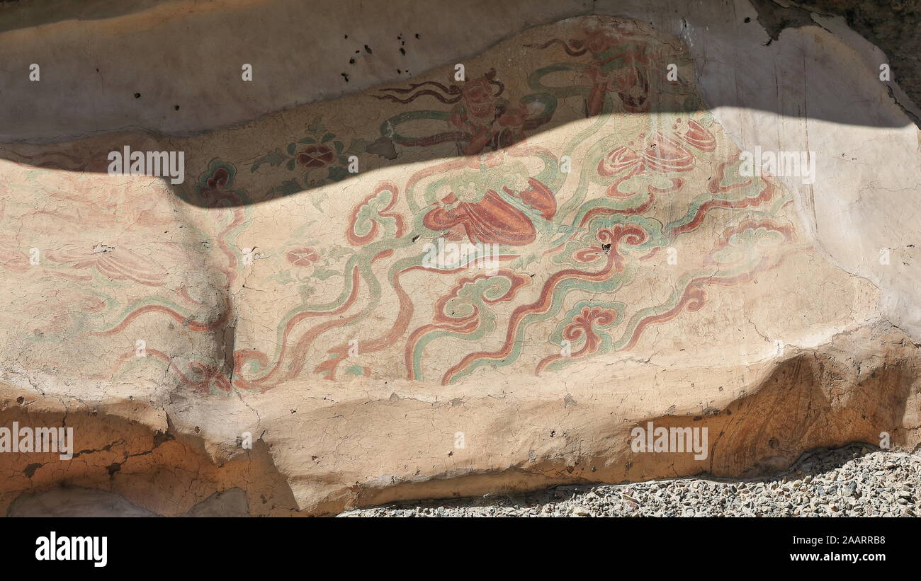 Remnants of painted frescoes-Mogao Buddhist caves exterior. Dunhuang-Gansu province-China-0612 Stock Photo