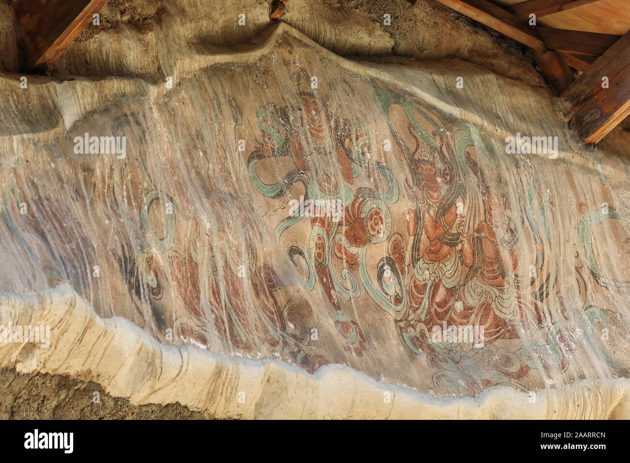 Remnants of painted frescoes-Mogao Buddhist caves exterior. Dunhuang-Gansu province-China-0626 Stock Photo