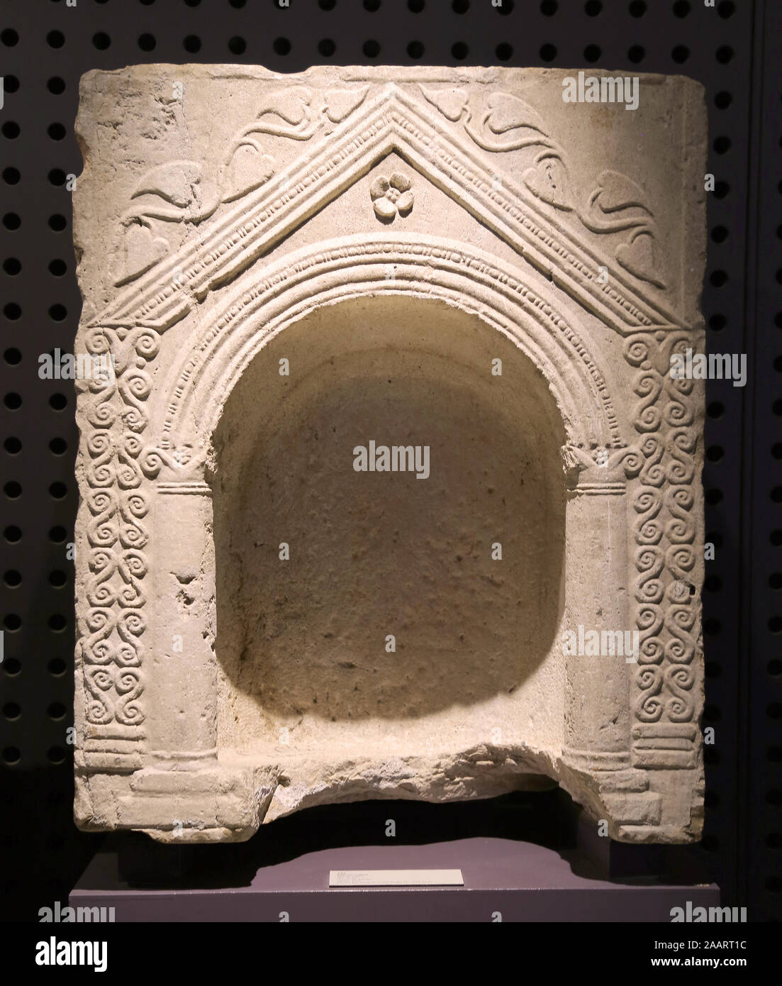 Votive niche. Roman Era, 3rd century AD. Marble. Quinta de Marim, Olhao, Faro, Portugal. Museu Nacional Arqueologia. Stock Photo
