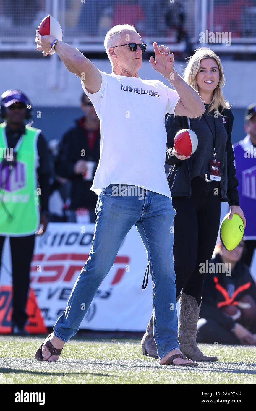 Las Vegas, NV, USA. 23rd Nov, 2019. Kenny Mayne, an alumnus of the UNLV Rebels, throws a nerf football during a contest while attending the NCAA Football game featuring the San Jose State Spartans and the UNLV Rebels at Sam Boyd Stadium in Las Vegas, NV. Christopher Trim/CSM/Alamy Live News Stock Photo