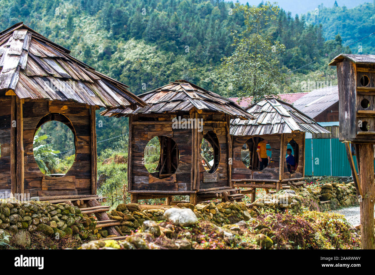 Big wooden huts used for resting and sleeping whilst admiring the stunning views from Cat Cat village in North Vietnam, near Sapa Stock Photo