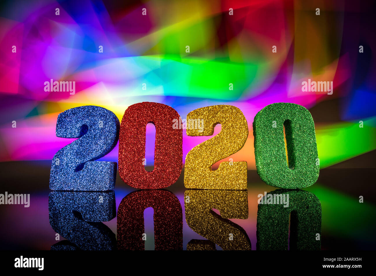 2020 new years 3D Numbers with vivid colorful abstract background - new years celebration concept image Stock Photo