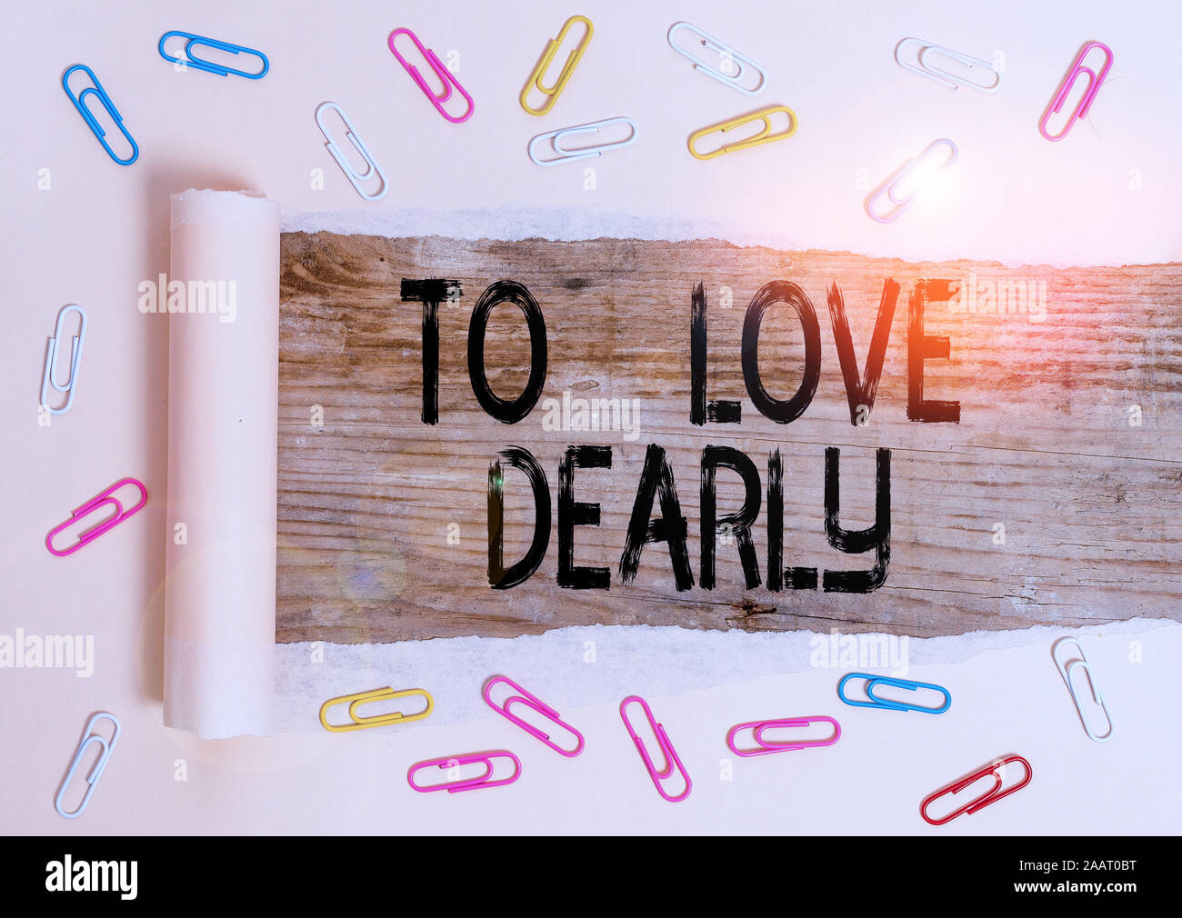 Conceptual Hand Writing Showing To Love Dearly Concept Meaning Love Someone Very Much In The More Humble Way And Aimlessly Paper Clip And Torn Cardbo Stock Photo Alamy