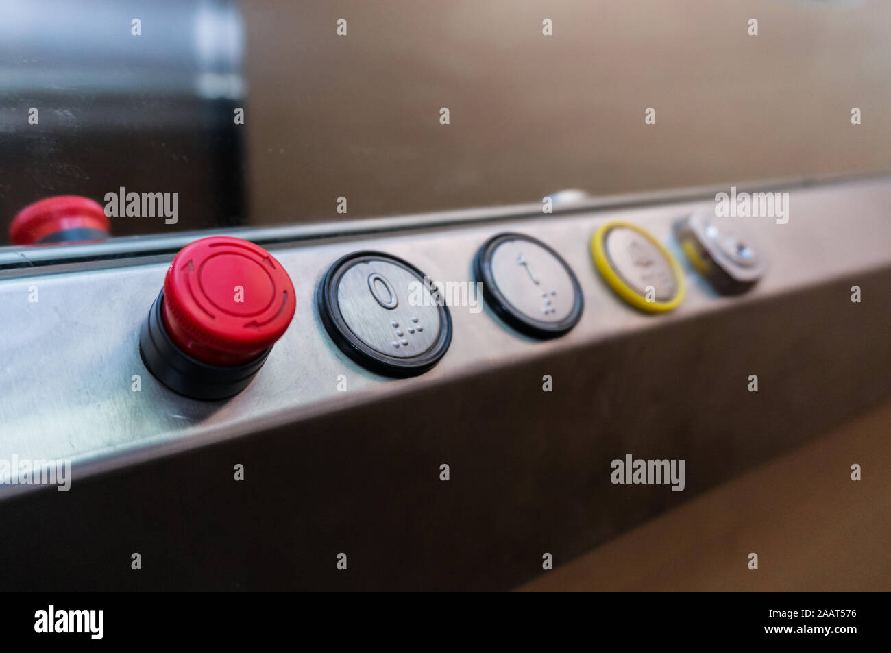 Emergency stop button of an elevator for security Stock Photo