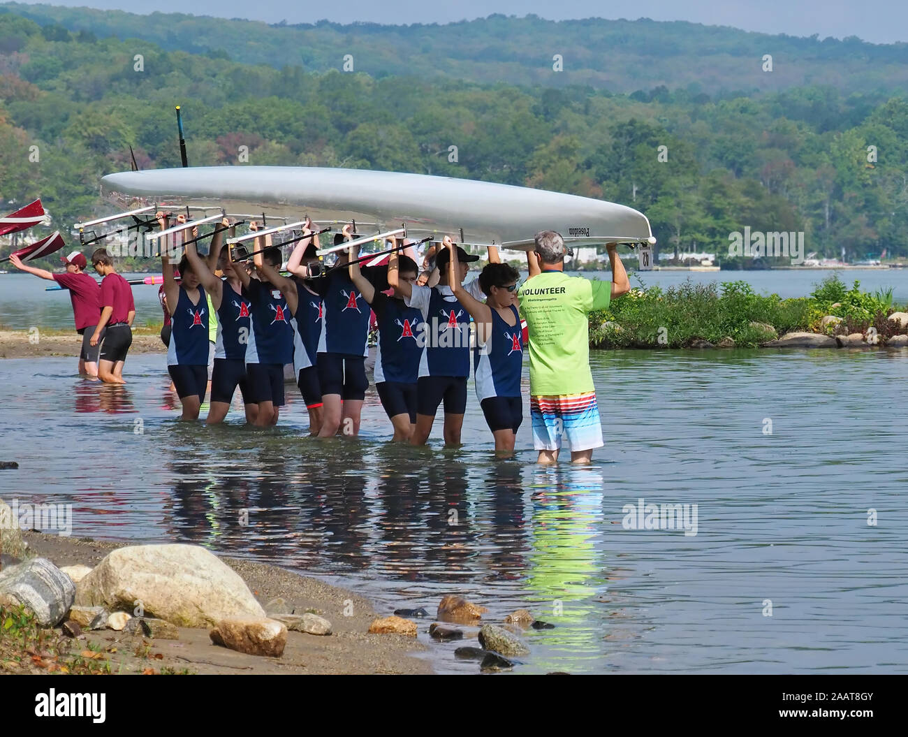 East Hampton, CT USA. Sep 2017. Racing Crew teams doing a wet launch, which is placing racing shell in water without an available dock. Stock Photo