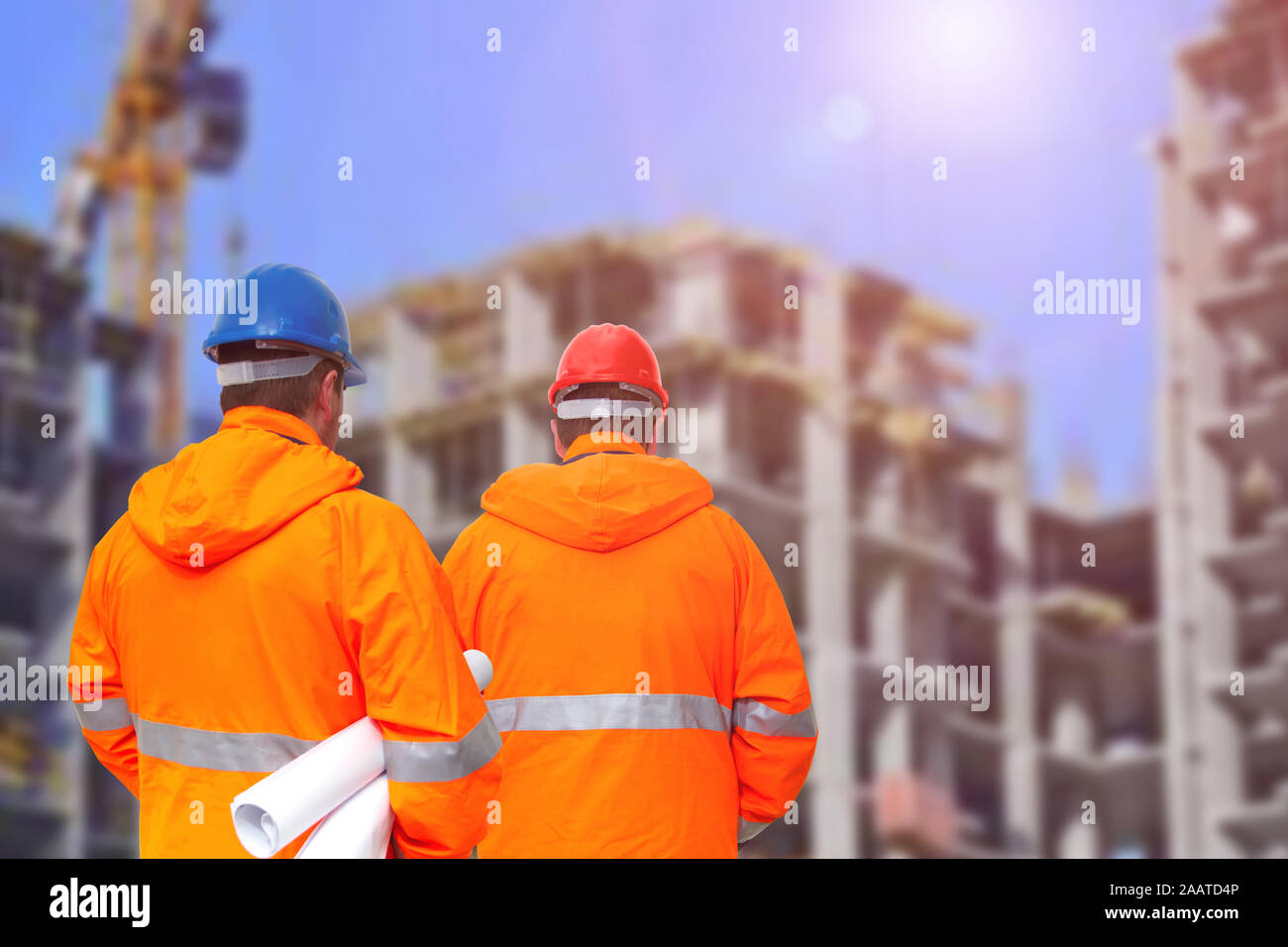 Two engineers looking at consrtuction site Stock Photo