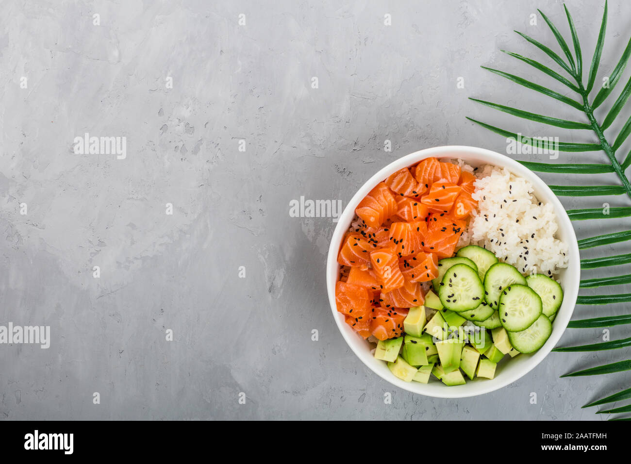 Download Hawaiian Salmon Bowl With Cucumbers Avocado Sesame Seeds And Rice Top View Overhead Flat Lay Mock Up Template Healthy Food Concept Stock Photo Alamy