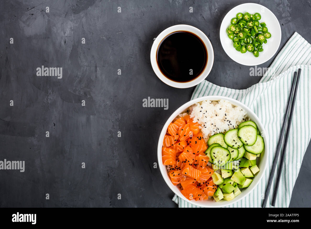 Download Hawaiian Salmon Bowl With Cucumbers Avocado Sesame Seeds And Rice Top View Overhead Flat Lay Mock Up Template Healthy Food Concept Stock Photo Alamy
