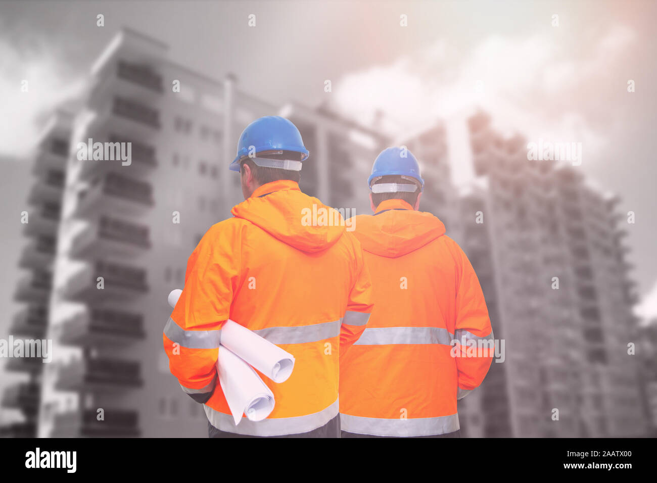 Two engineers looking at consrtuction site Stock Photo