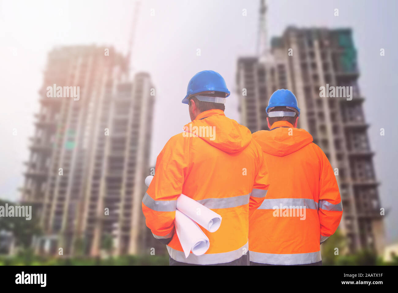 Two engineers looking at consrtuction site Stock Photo