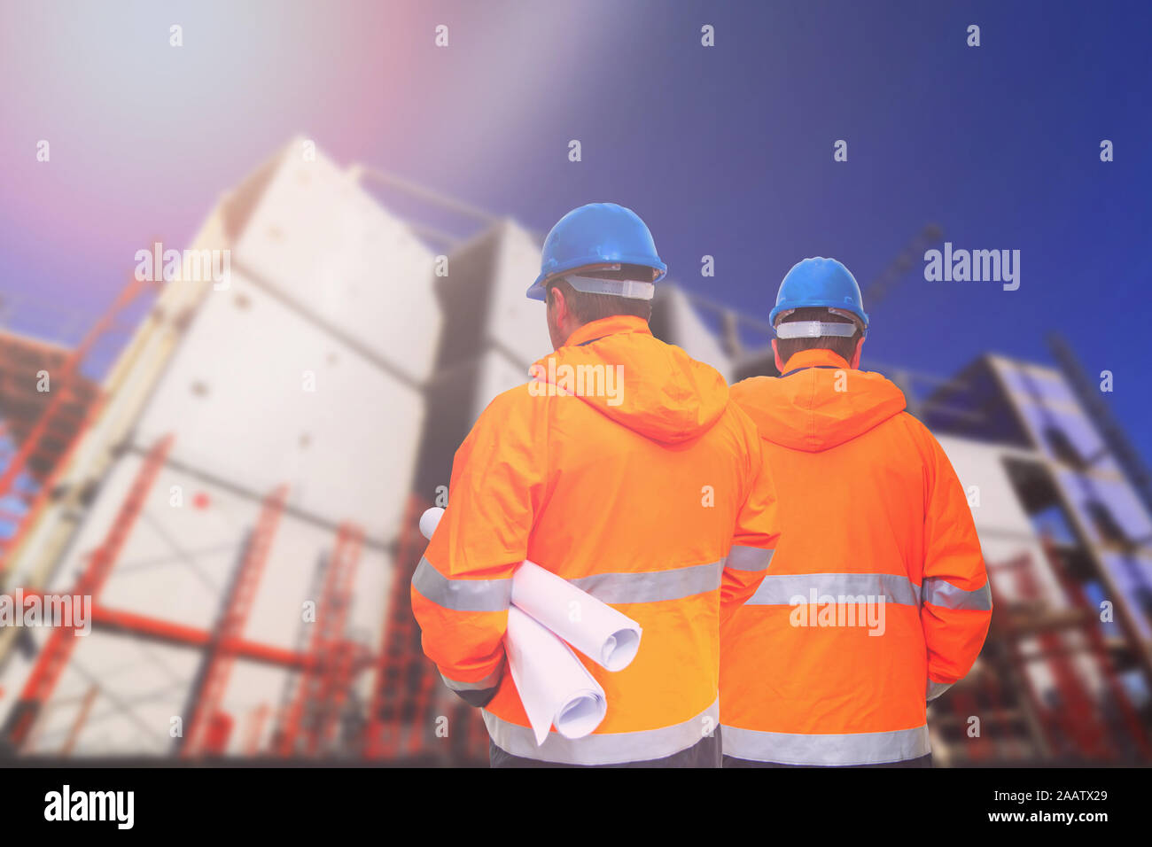 Two engineers looking at consrtuction site Stock Photo