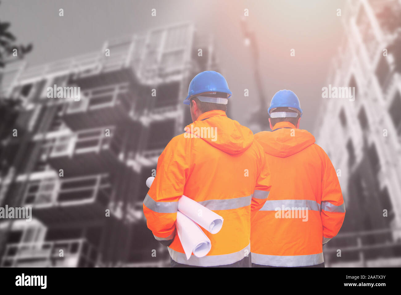 Two engineers looking at consrtuction site Stock Photo