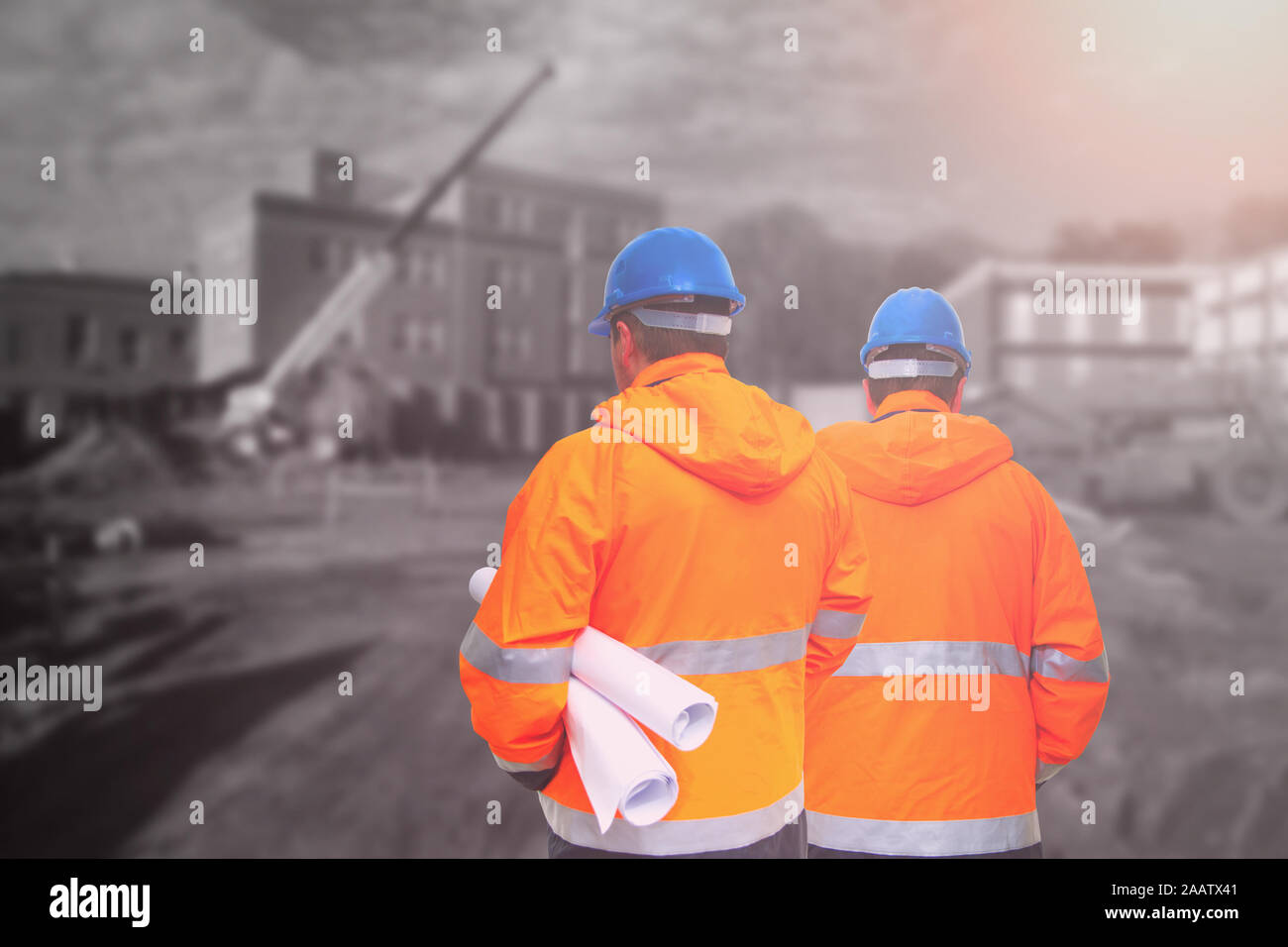 Two engineers looking at consrtuction site Stock Photo