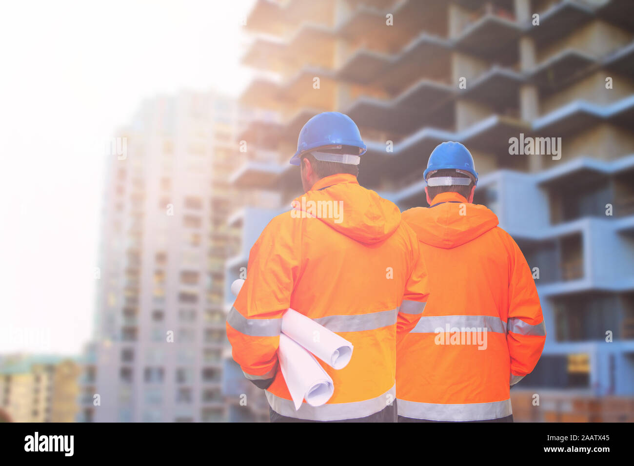 Two engineers looking at consrtuction site Stock Photo