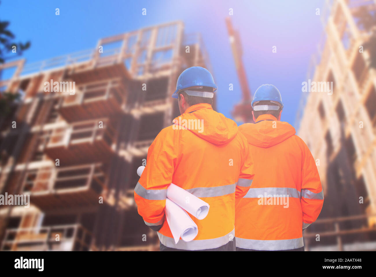 Two engineers looking at consrtuction site Stock Photo